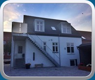 Baggrd set mod huset