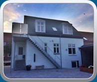 Baggrd set mod huset